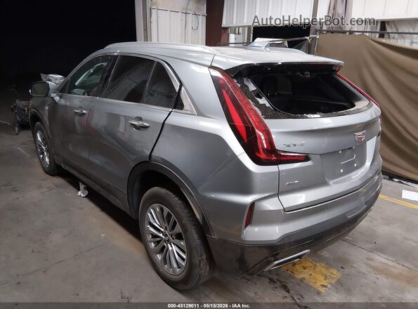 1GYFZDR41RF156050 2024 CADILLAC XT4 Silver Trasero izquierdo