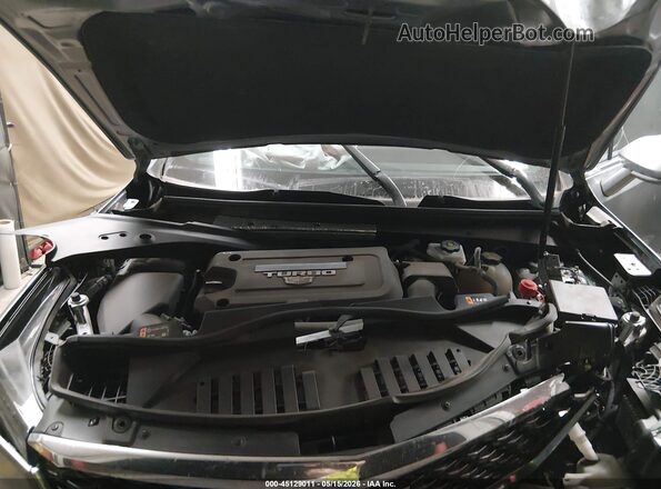1GYFZDR41RF156050 2024 CADILLAC XT4 Silver Vista trasera