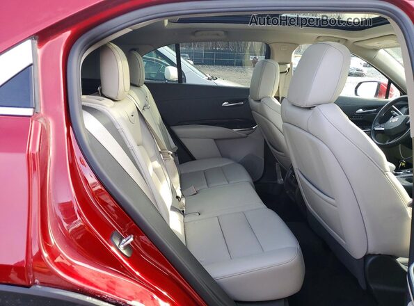 1GYFZDR42PF107498 2023 CADILLAC XT4 Red Widok wnętrza z tyłu