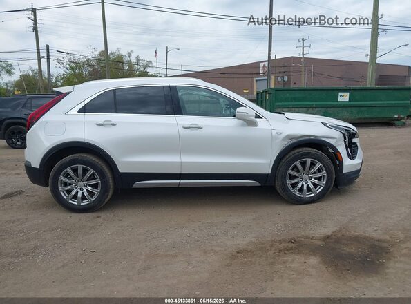 1GYFZDR45MF011392 2021 CADILLAC XT4 White Սալոնի հետևի տեսք