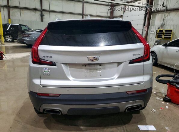 1GYFZDR46MF039945 2021 CADILLAC XT4 Silver Rear view