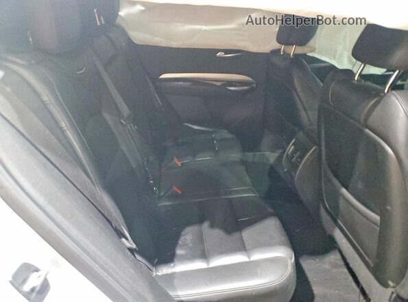 1GYFZDR46MF039945 2021 CADILLAC XT4 Silver Rear interior view
