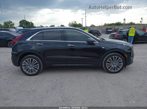 1GYFZDR46RF100671 2024 CADILLAC XT4 Black Вид задньої частини салону