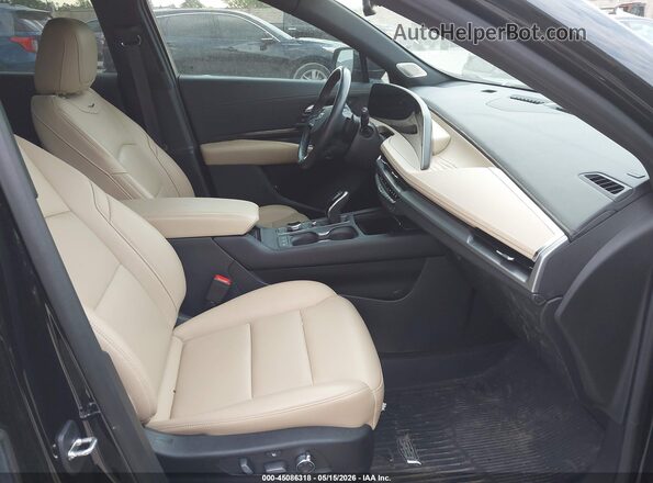 1GYFZDR46RF100671 2024 CADILLAC XT4 Black Вид салону спереду