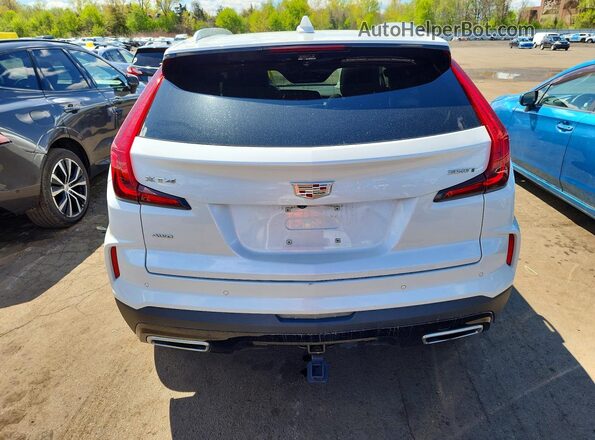 1GYFZDR46RF238520 2024 CADILLAC XT4 White Вид ззаду