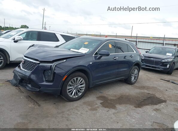 1GYFZDR47RF127636 2024 CADILLAC XT4 Dark Blue Вид задней части салона