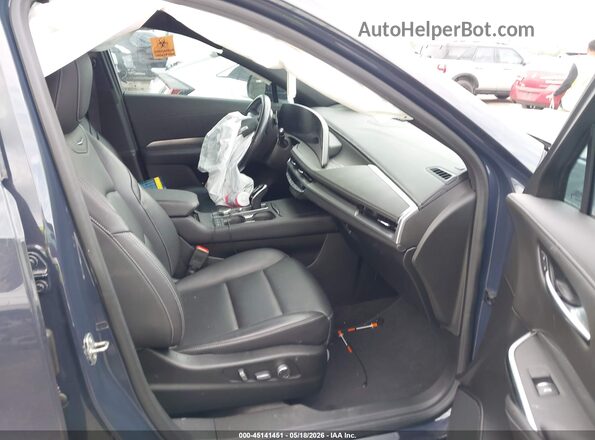 1GYFZDR47RF127636 2024 CADILLAC XT4 Dark Blue Вид салона спереди