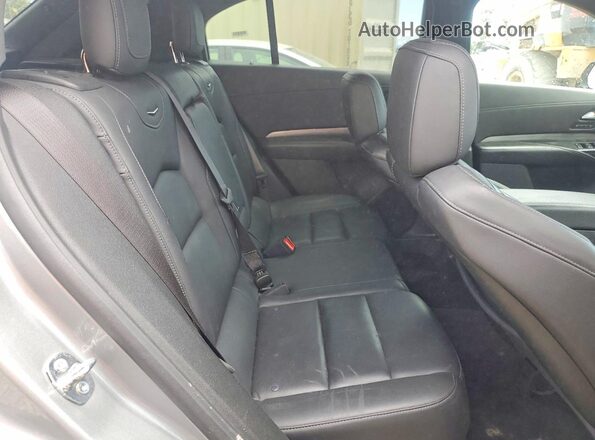 1GYFZDR48RF133090 2024 CADILLAC XT4 Silver Սալոնի հետևի տեսք