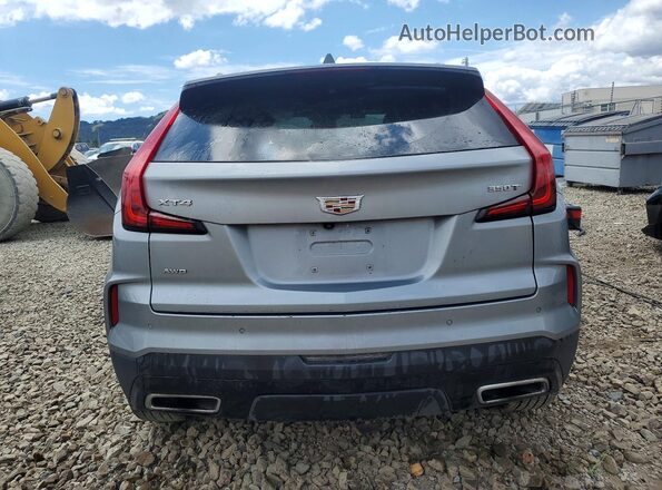 1GYFZDR48RF133090 2024 CADILLAC XT4 Silver Հետևի տեսք