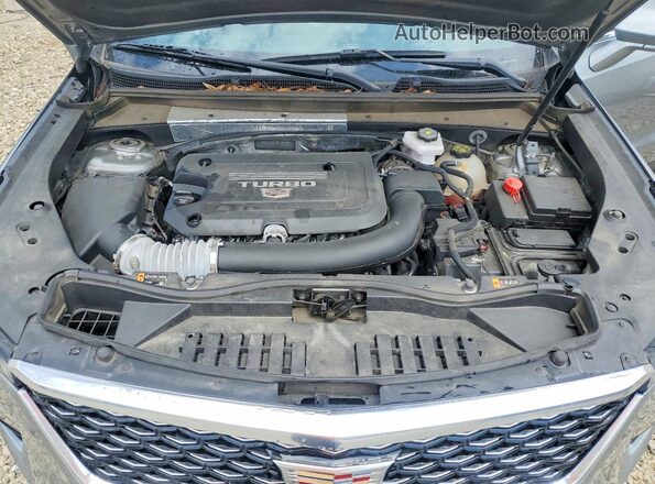 1GYFZDR48RF133090 2024 CADILLAC XT4 Silver Շարժիչի բաժամունքի տեսք