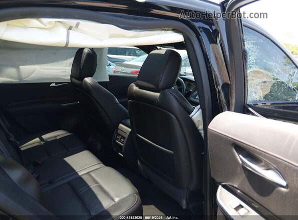 1GYFZER44KF199714 2019 CADILLAC XT4 Black VIN კოდის სტიკერის ხედი