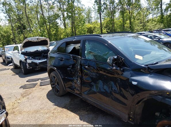 1GYFZER44KF199714 2019 CADILLAC XT4 Black უკანა სალონის ხედი