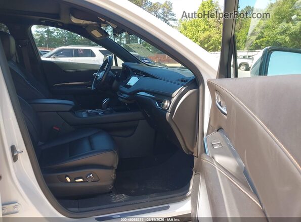 1GYFZER44MF079236 2021 CADILLAC XT4 White Widok wnętrza z przodu