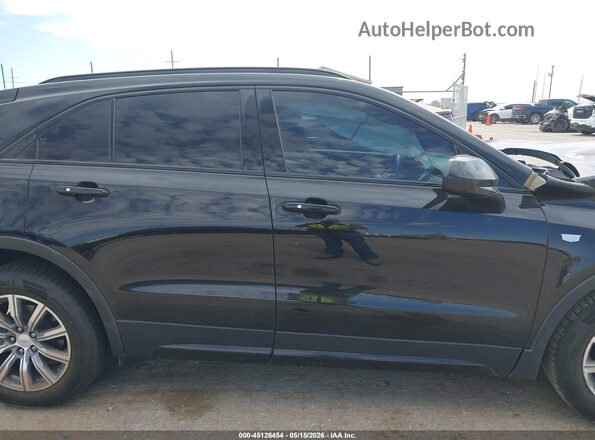 1GYFZER46KF119975 2019 CADILLAC XT4 Black Սարքավորումների վահանակի տեսք