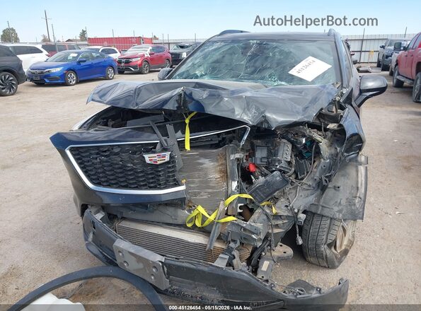 1GYFZER46KF119975 2019 CADILLAC XT4 Black Դիմացի տեսք