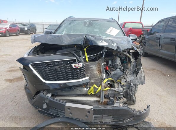 1GYFZER46KF119975 2019 CADILLAC XT4 Black Առջևի վահանակի տեսք