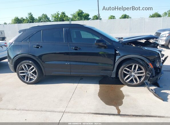 1GYFZER47KF189081 2019 CADILLAC XT4 Black Rear interior view