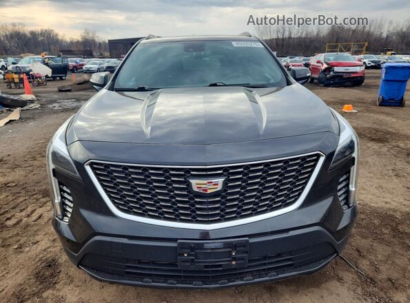 1GYFZFR48MF028070 2021 CADILLAC XT4 Black Front view