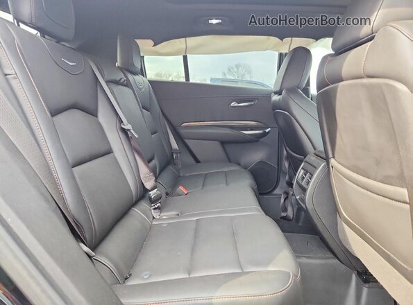1GYFZFR48MF028070 2021 CADILLAC XT4 Black Rear seats view