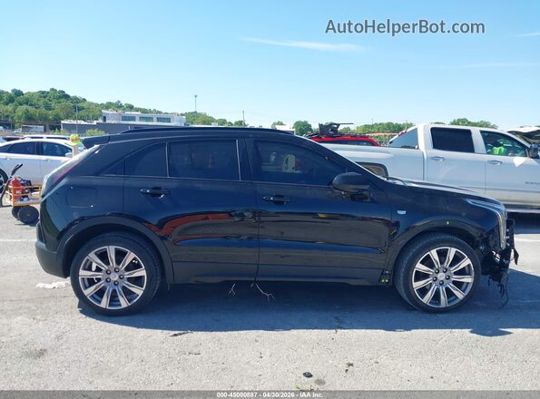 1GYFZFR49KF101945 2019 CADILLAC XT4 Black Սալոնի հետևի տեսք