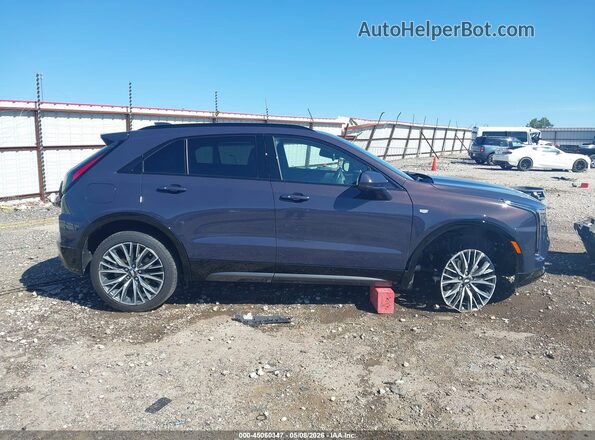 1GYFZFR4XRF193111 2024 CADILLAC XT4 Gray Widok wnętrza z tyłu