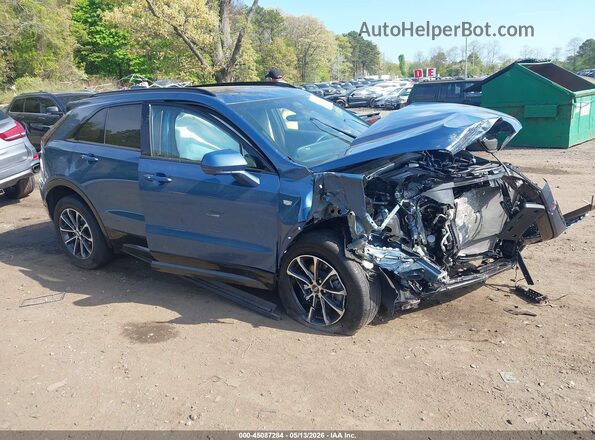 1GYFZFR4XSF150278 2025 CADILLAC XT4 Blue Սալոնի հետևի տեսք