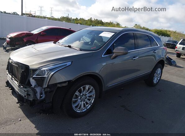1GYKNARS8KZ109965 2019 CADILLAC XT5 Beige Vista tres cuartos delantera izquierda