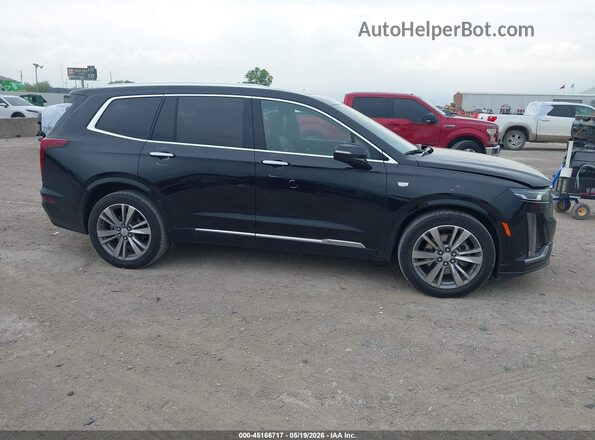 1GYKPCRS4PZ151238 2023 CADILLAC XT6 Black Вид задньої частини салону