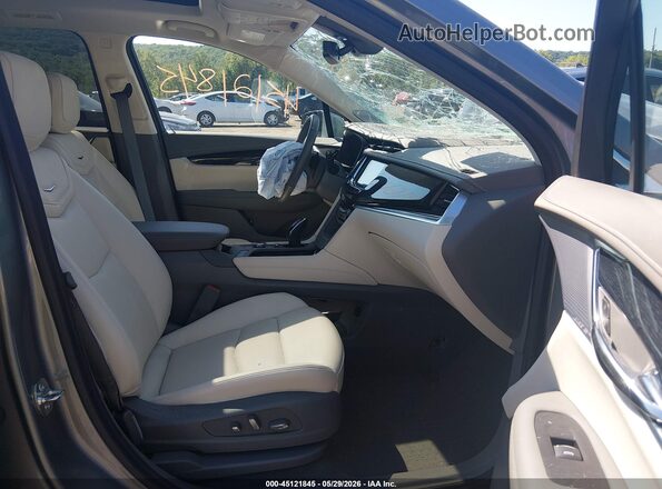 1GYKPDRS8SZ129306 2025 CADILLAC XT6 Gray Vista interior delantera