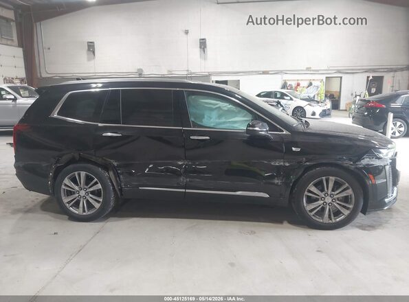 1GYKPDRSXRZ705696 2024 CADILLAC XT6 Черный Вид задней части салона