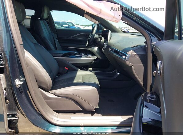 1GYKPRRL1RZ115246 2024 CADILLAC OTHER Зеленый Вид салона спереди