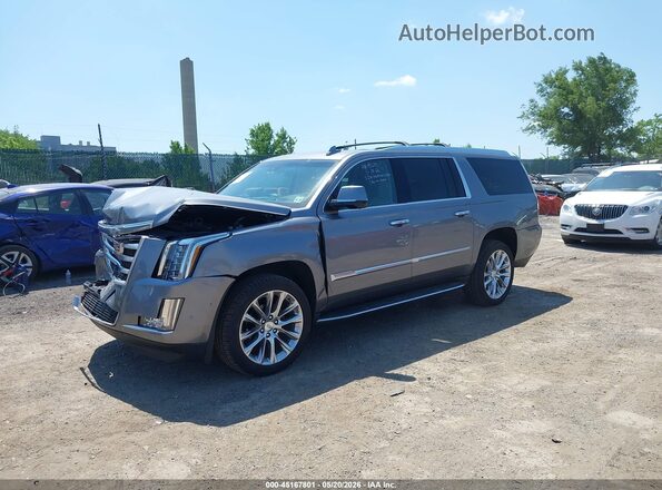 1GYS4HKJ7KR203140 2019 CADILLAC ESCALADE Silver Vista tres cuartos delantera izquierda