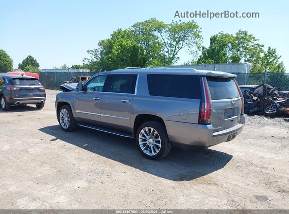 1GYS4HKJ7KR203140 2019 CADILLAC ESCALADE Silver Trasero izquierdo