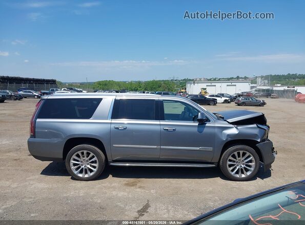 1GYS4HKJ7KR203140 2019 CADILLAC ESCALADE Silver Vista interior trasera