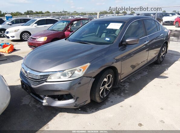 1HGCR2F39HA020853 2017 HONDA ACCORD Gray Vista tres cuartos delantera izquierda