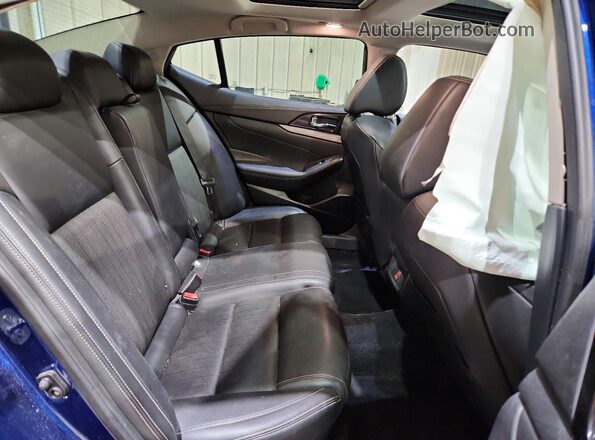 1N4AA6AP3JC374396 2018 NISSAN MAXIMA Blue Vista de los asientos traseros