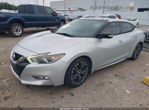 1N4AA6AP5GC433912 2016 NISSAN MAXIMA Серебряный Передняя левая четверть