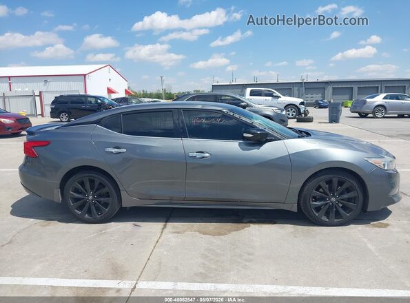 1N4AA6AP6HC457542 2017 NISSAN MAXIMA Gray Widok wnętrza z tyłu