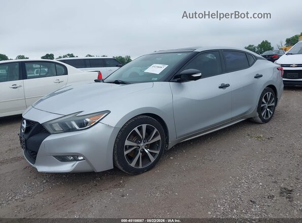 1N4AA6AP7GC386592 2016 NISSAN MAXIMA Серебряный Передняя левая четверть