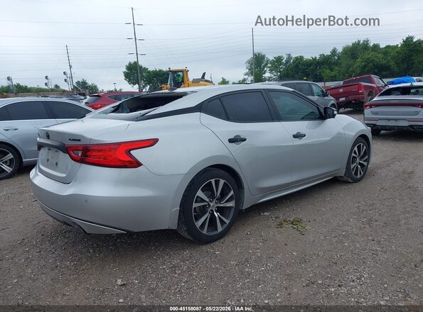 1N4AA6AP7GC386592 2016 NISSAN MAXIMA Серебряный Задняя правая четверть