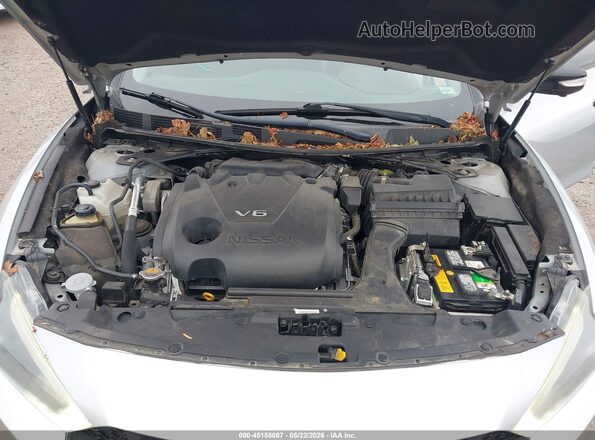 1N4AA6AP7GC386592 2016 NISSAN MAXIMA Серебряный Вид сзади