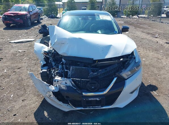 1N4AA6AP8JC392599 2018 NISSAN MAXIMA Белый Вид задней части салона