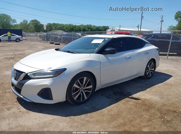 1N4AA6AV6KC379933 2019 NISSAN MAXIMA White Vista tres cuartos delantera izquierda
