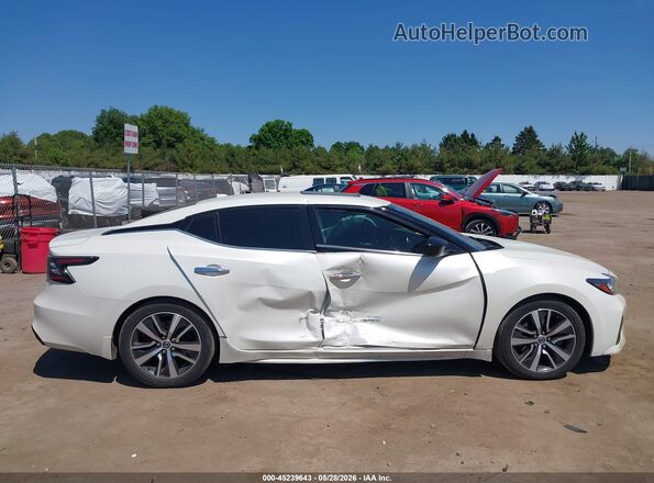 1N4AA6AV6KC379933 2019 NISSAN MAXIMA White Vista interior trasera