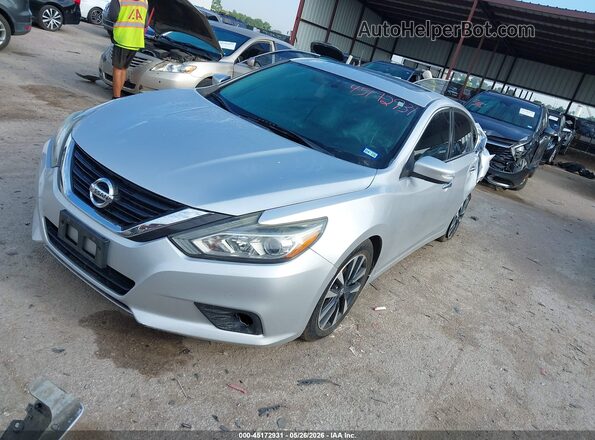 1N4AL3AP0JC230295 2018 NISSAN ALTIMA Silver წინა მარცხენა ხედი სამი მეოთხედიდან