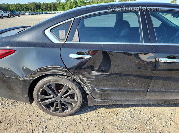 1N4AL3AP0JC256119 2018 NISSAN ALTIMA Black Vista de los asientos traseros