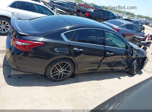 1N4AL3AP1JC284186 2018 NISSAN ALTIMA Black Rear interior view