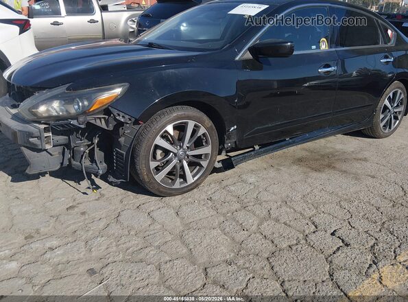 1N4AL3AP5GC240572 2016 NISSAN ALTIMA Black Widok wnętrza z tyłu
