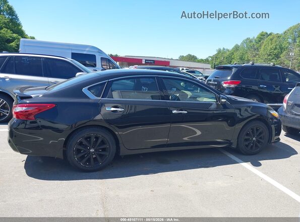 1N4AL3AP6JC152749 2018 NISSAN ALTIMA Black Սալոնի հետևի տեսք