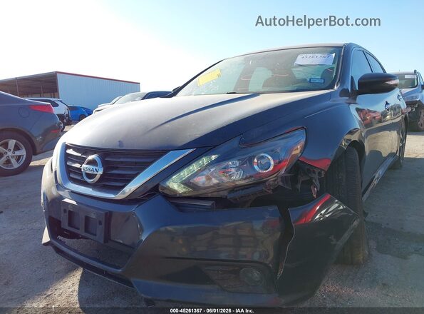 1N4AL3AP7JC199255 2018 NISSAN ALTIMA Gray Widok z przodu